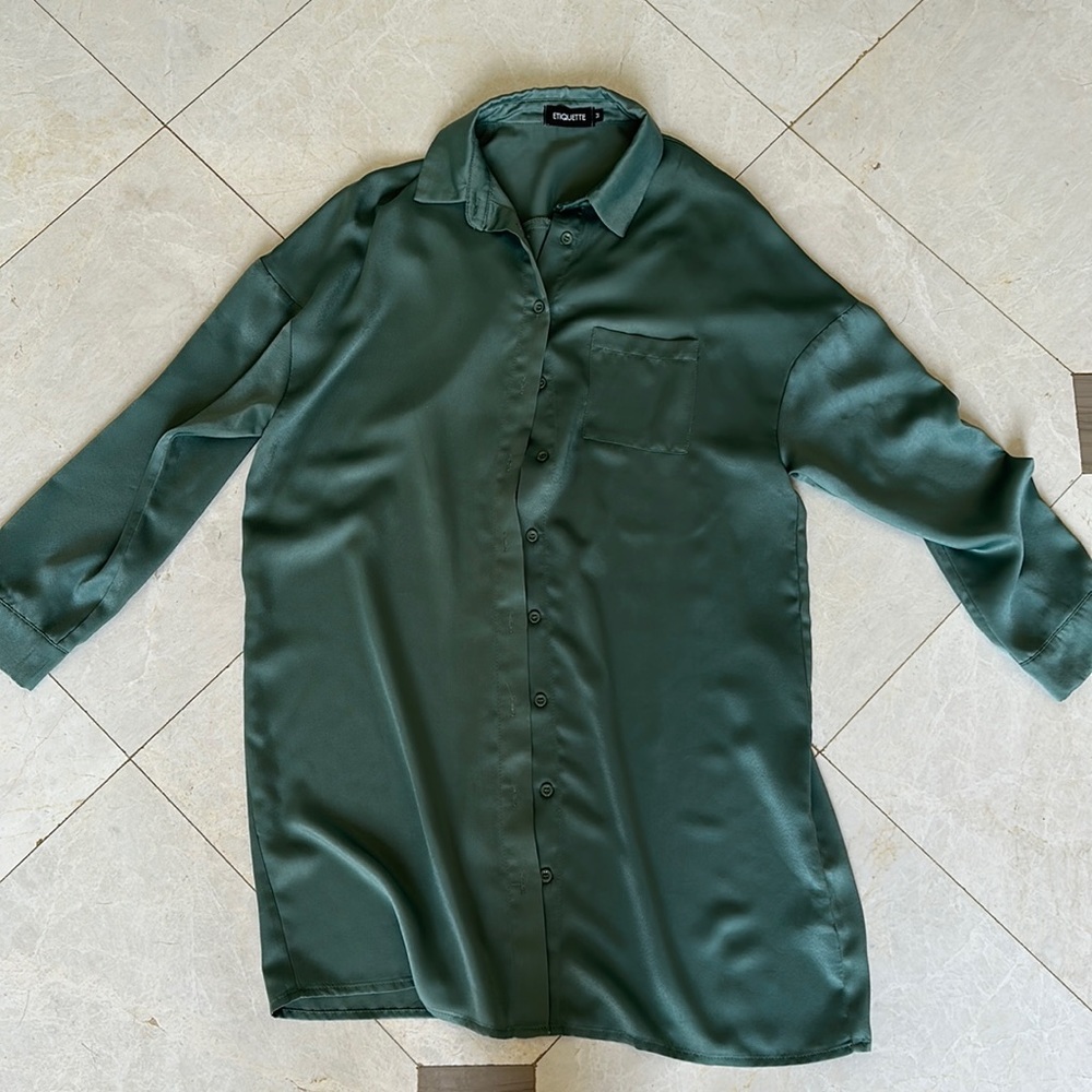 Green button down dress without belt.